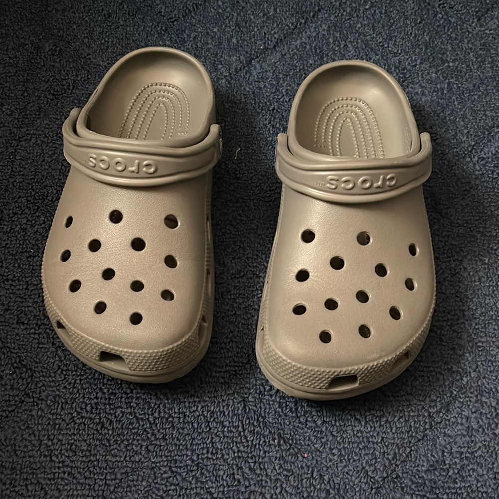 Crocs. Gray. Junior size 6. Womens size 8.
